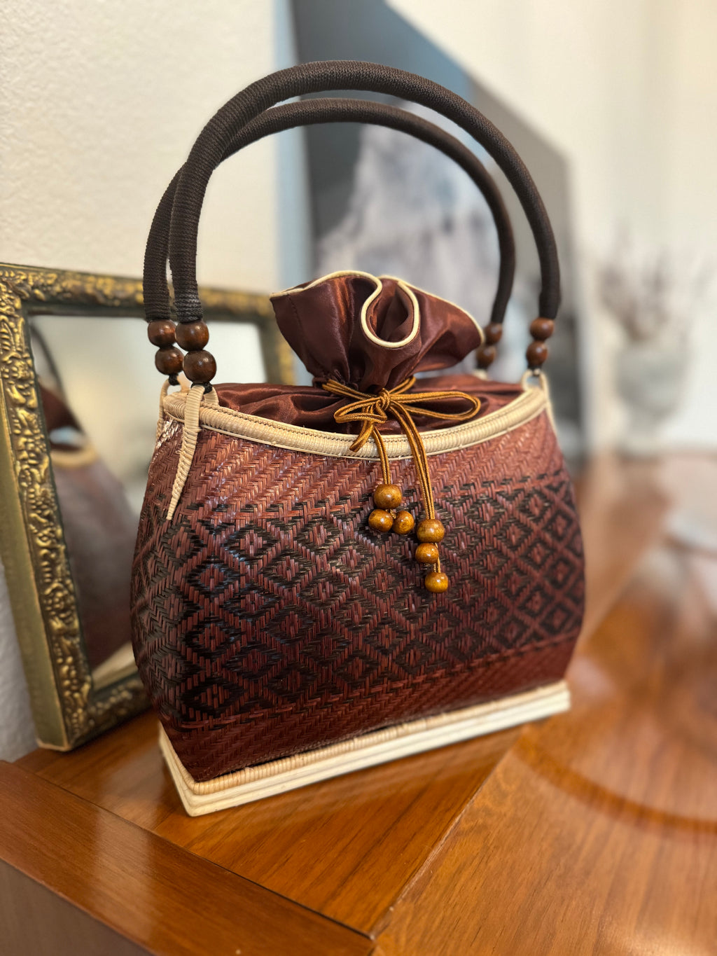brown woven bag by thai kraft